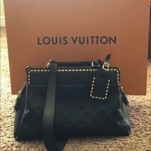Louis Vuitton Monogram Empreinte Leather Vosges MM